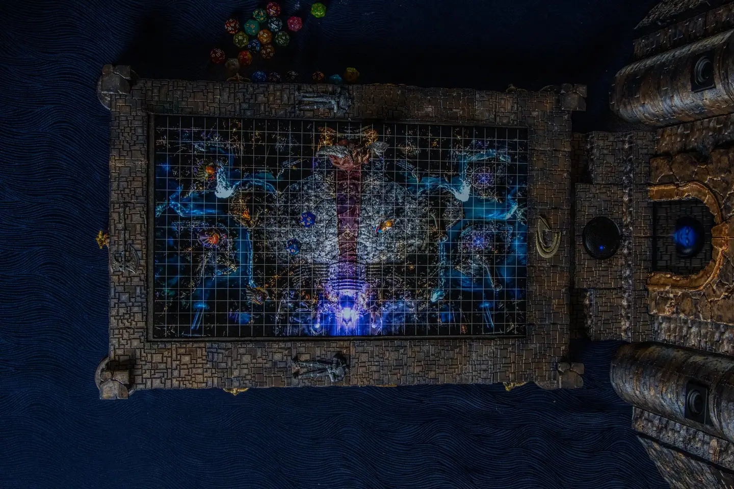 Top view of the Doungim map board showing a glowing blue map, next to the gate unit